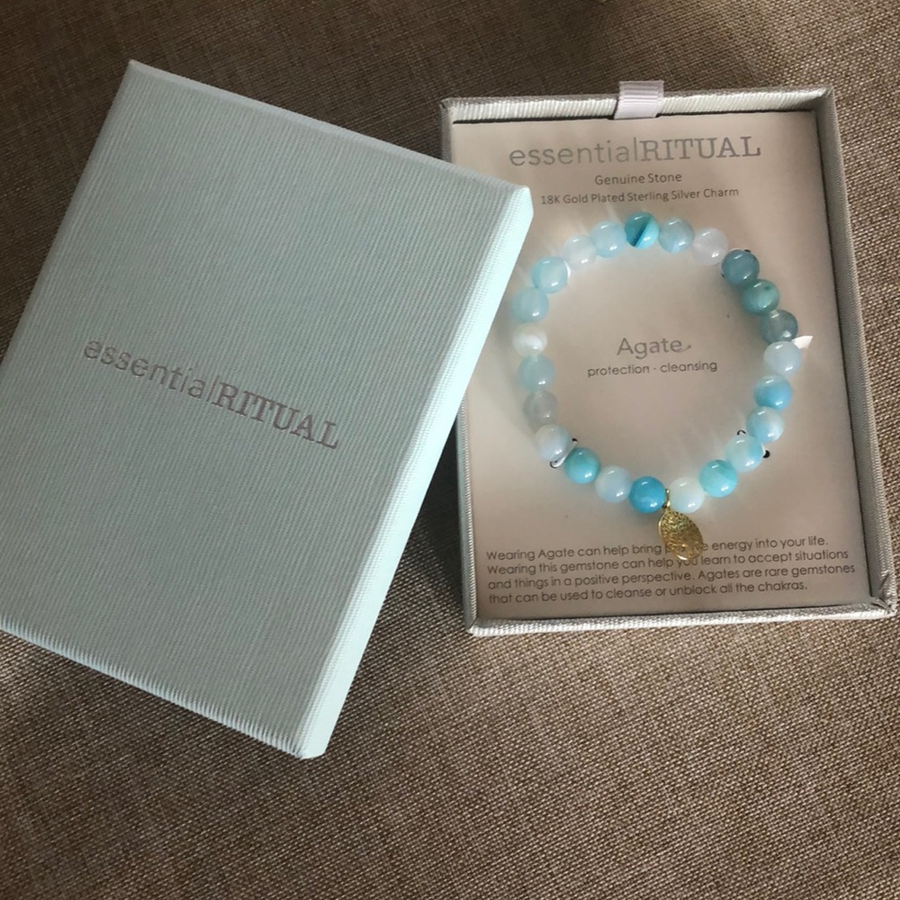 NWT essential ritual turquoise and white bracelet with a gold tree of life charm